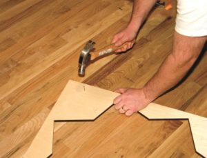 Photo 2: Fastening medallion template to main field of flooring