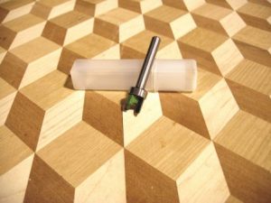 Photo 3: Using a plunge router and bit, cut away the existing flooring on the inside of the template.