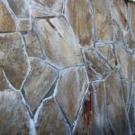 Moisture migration from voids underneath stone tiles.
