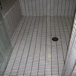 Slippery tile specified causing plumbing official to close the steam room