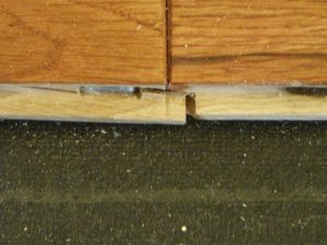 Overdriven fastener at end joint