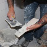 Applying mortar flat back troweling