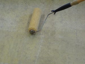 Rolling the Adhesive