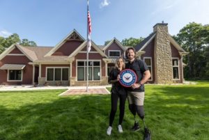 At the home dedication in Oconomowoc, Wis.