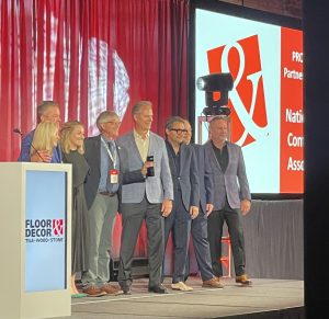 NTCA Heinlein accepting Floor & Decor award