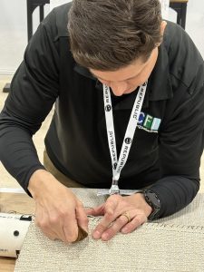George Orta NFIC hand sewing demo at TISE 2025
