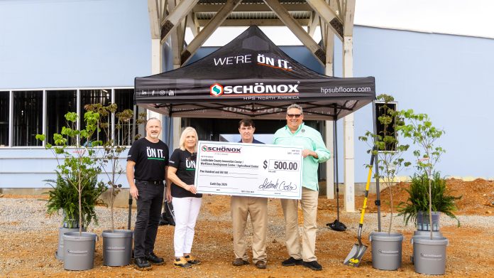 Schonox staff donate trees via a $500 check to the Lauderdale County Innovation Center.