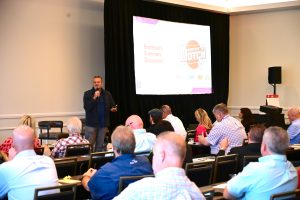 Brian Boek presents during the NTCA Five-Star Summer Meeting.