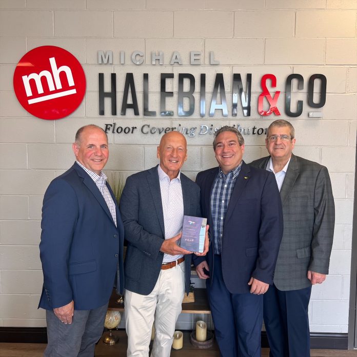 Michael Halebian & Co. executives accepting the Toli Homogenous Tile Award from Jeff Katz of Toli.