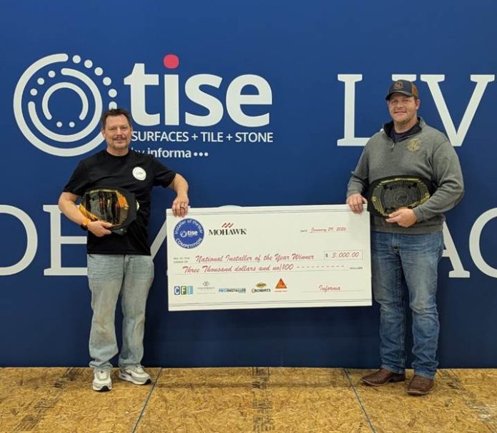 National Installers of the Year James Salisbury and Allen Lewis pose with their $3,000 check.